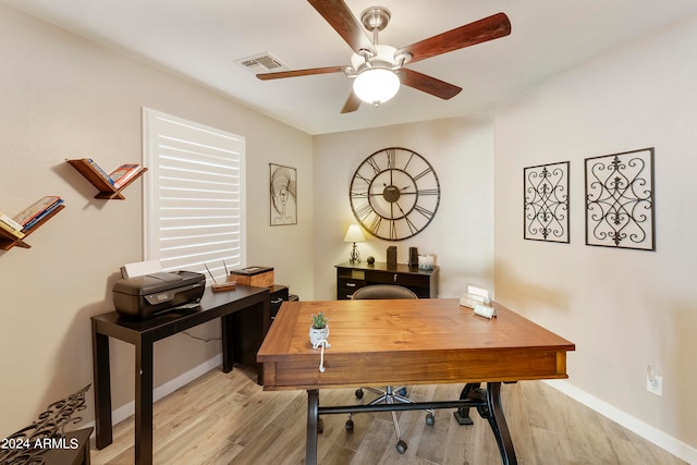 office space featuring light hardwood / wood-style flooring and ceiling fan