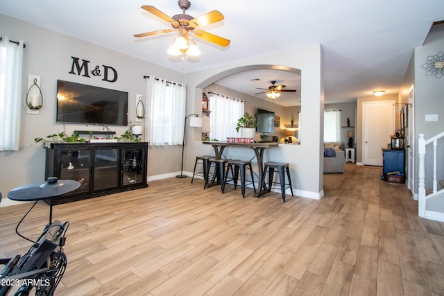 interior space featuring light hardwood / wood-style floors and ceiling fan