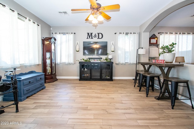 interior space featuring ceiling fan and light hardwood / wood-style flooring