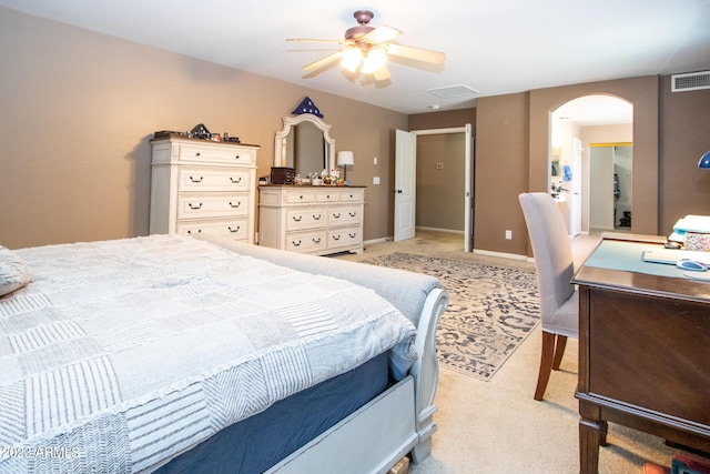 bedroom featuring ceiling fan and light carpet