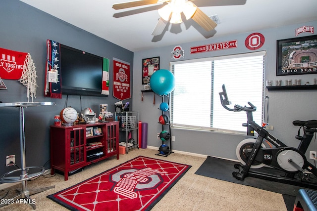 workout area with ceiling fan