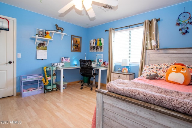 bedroom featuring light hardwood / wood-style floors and ceiling fan