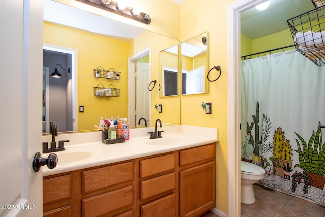 bathroom with vanity, a shower with curtain, tile patterned floors, and toilet