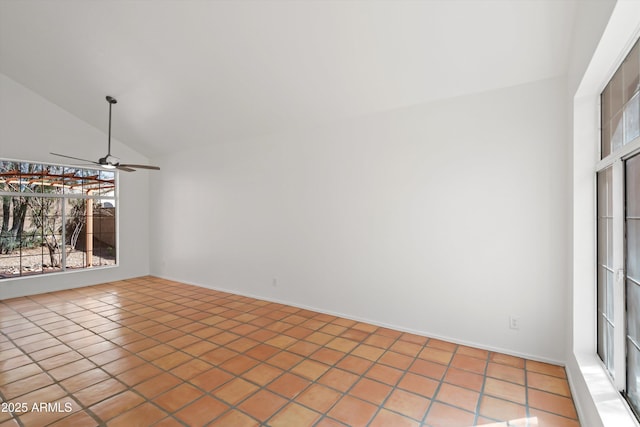 tiled empty room featuring high vaulted ceiling and ceiling fan