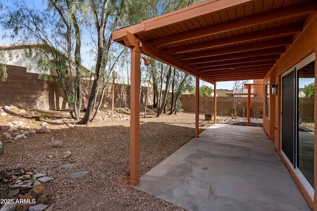 view of patio with a fenced backyard