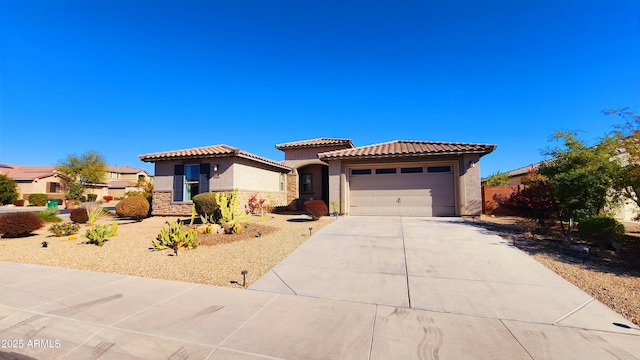 mediterranean / spanish-style home featuring a garage