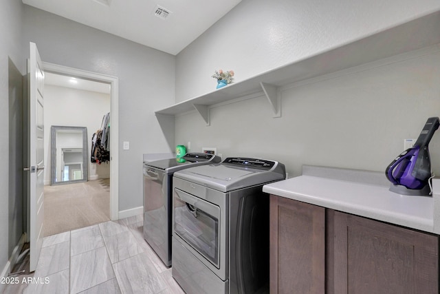 laundry area featuring washer and clothes dryer