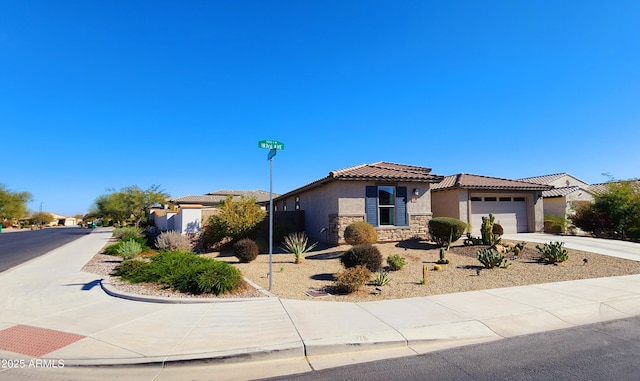 view of front of property with a garage