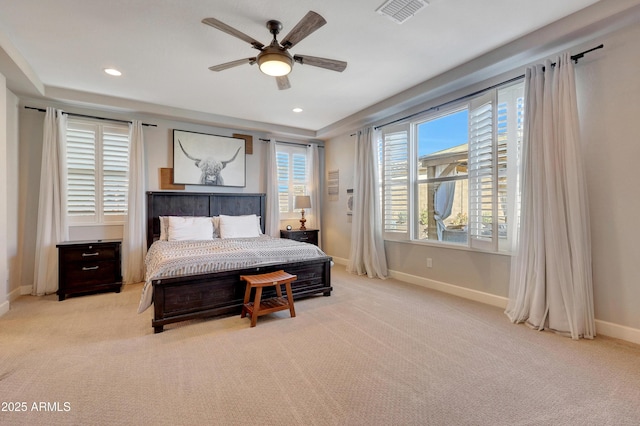 bedroom with light carpet and ceiling fan