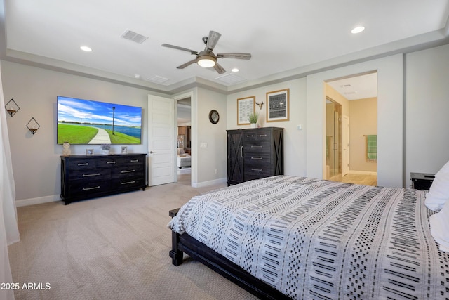 carpeted bedroom featuring ceiling fan and connected bathroom