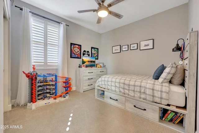 carpeted bedroom featuring ceiling fan