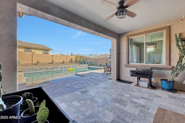 view of patio / terrace with grilling area and ceiling fan