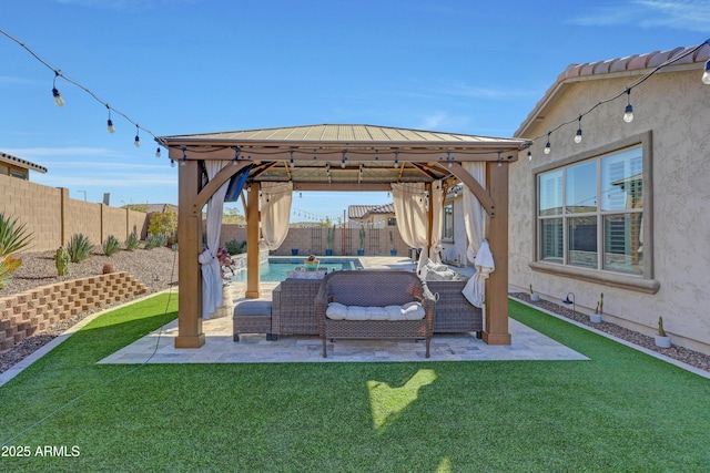 view of patio featuring a gazebo, an outdoor living space, and a fenced in pool