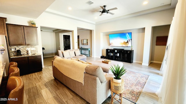 living room with ceiling fan