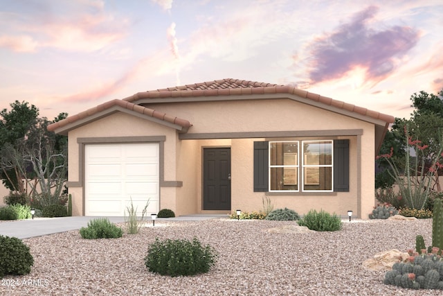 view of front of home featuring a garage