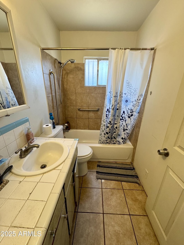 full bathroom featuring tile patterned flooring, vanity, shower / bathtub combination with curtain, and toilet