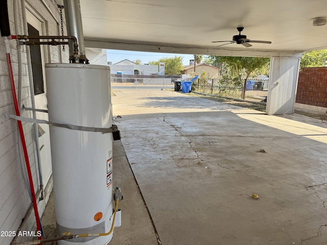 view of patio / terrace with water heater and ceiling fan