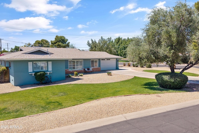 ranch-style home with a front yard, roof with shingles, an attached garage, and concrete driveway