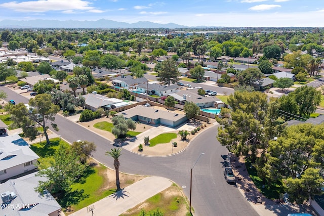 birds eye view of property featuring a residential view and a mountain view