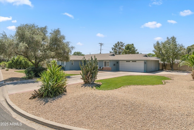 ranch-style house with a garage and concrete driveway