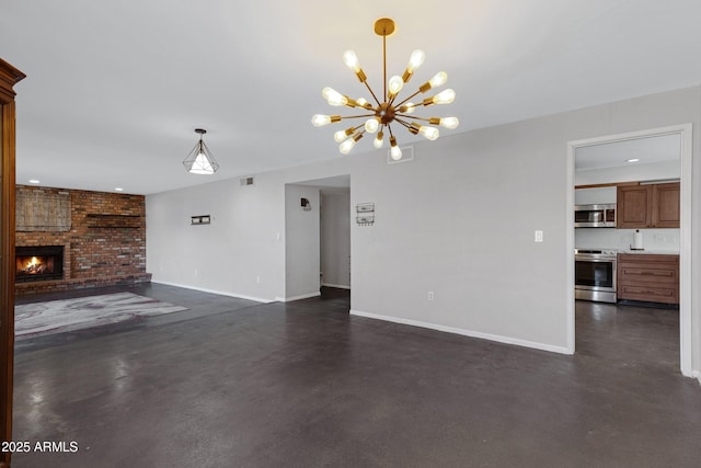 unfurnished living room featuring a fireplace and a notable chandelier