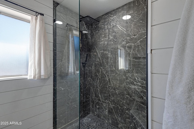 bathroom with a shower with shower curtain