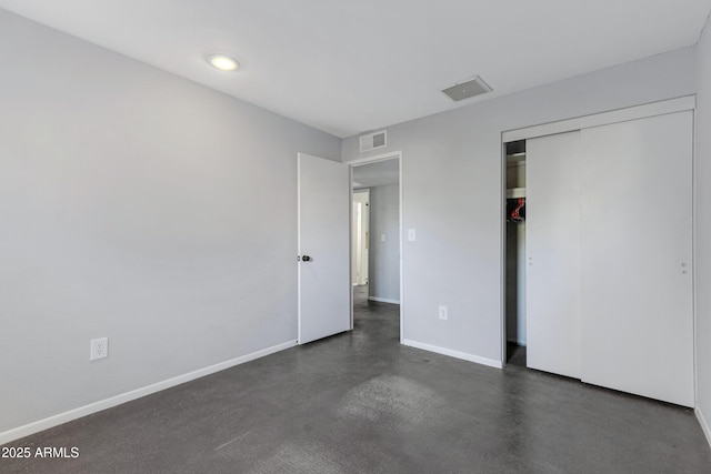 unfurnished bedroom with a closet