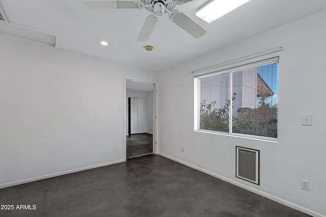 empty room featuring ceiling fan