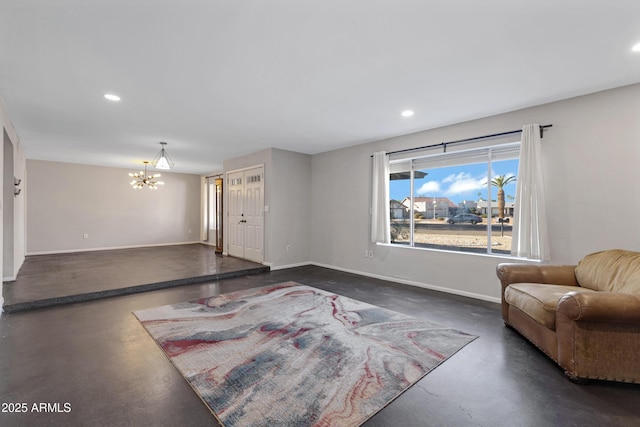 living room with a notable chandelier