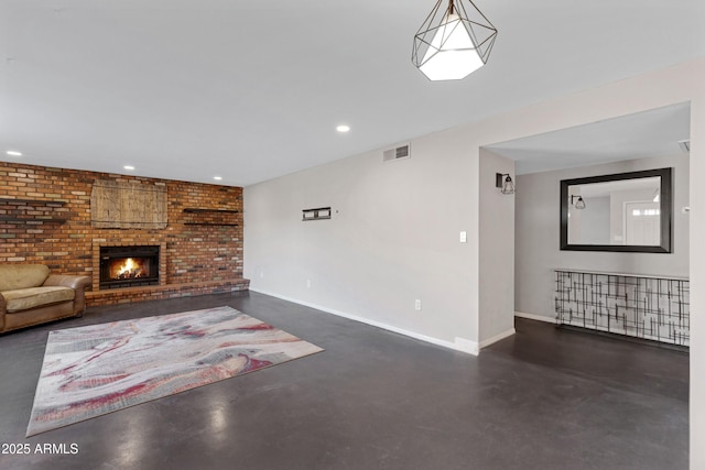 unfurnished living room featuring brick wall and a fireplace