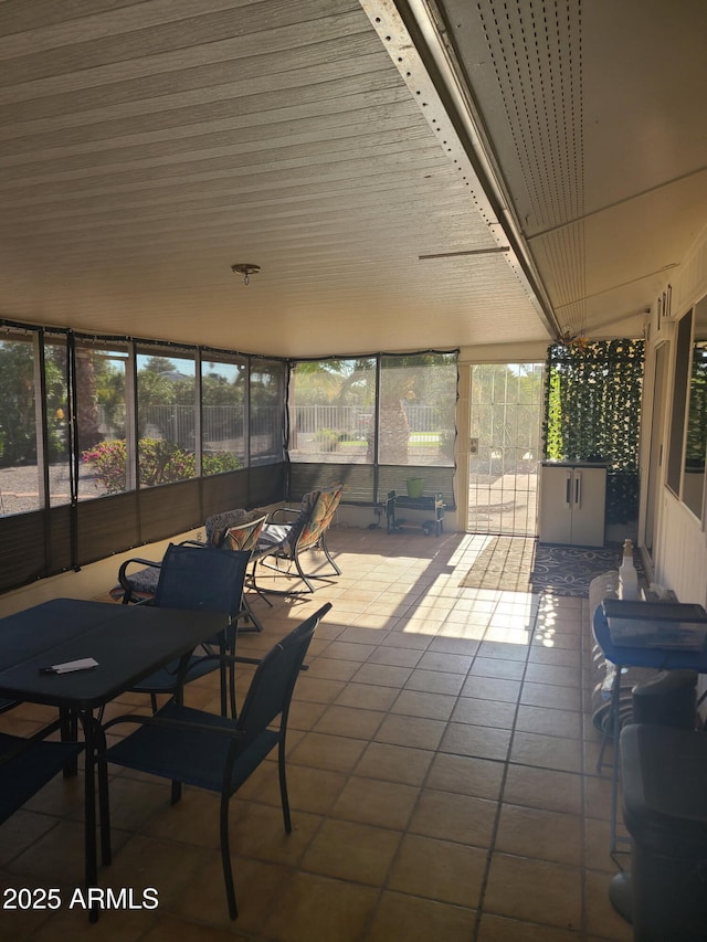 sunroom / solarium with a healthy amount of sunlight