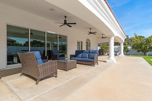 view of patio featuring ceiling fan and an outdoor hangout area