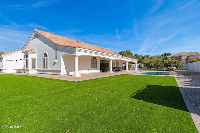 back of property with a yard, a patio area, and central air condition unit