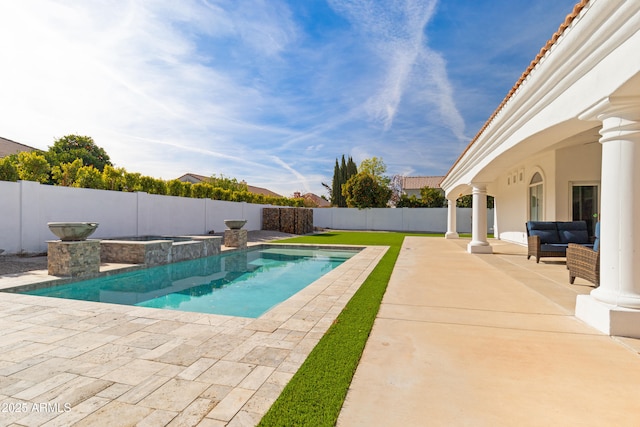 view of pool with a patio area