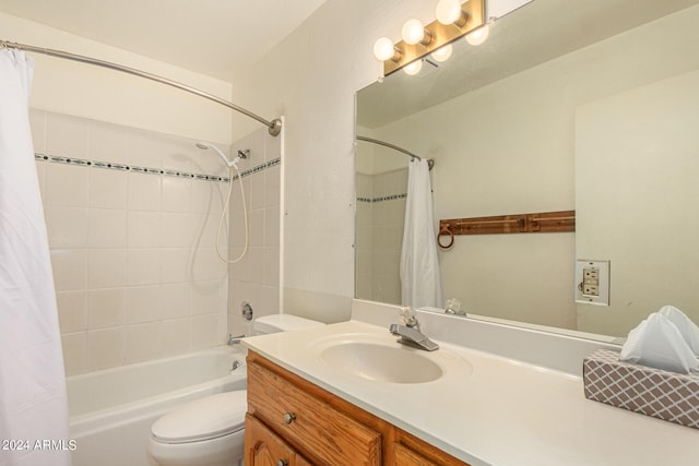 full bathroom featuring vanity, toilet, and shower / bath combo