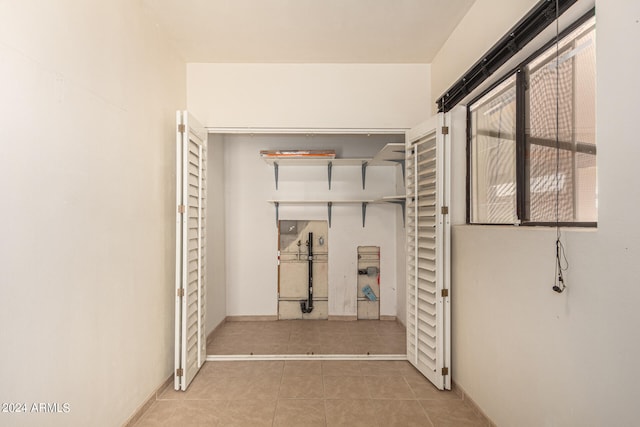 interior space with light tile patterned floors