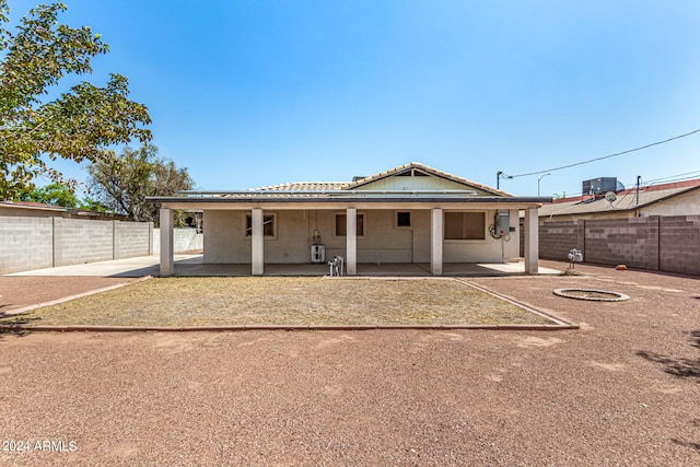 rear view of property with a patio