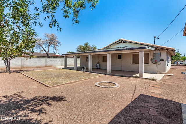 rear view of property with a patio