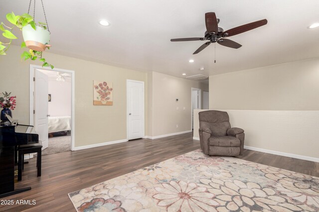 living area with recessed lighting, a ceiling fan, and dark wood-style flooring
