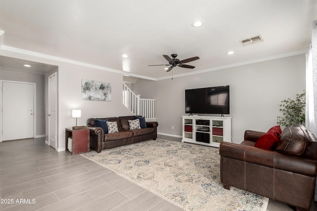 living area with crown molding, visible vents, ceiling fan, baseboards, and recessed lighting