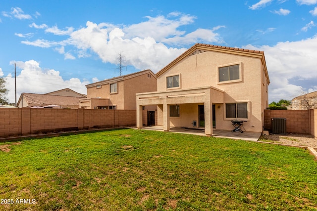 rear view of property featuring stucco siding, a patio area, central air condition unit, and a fenced backyard