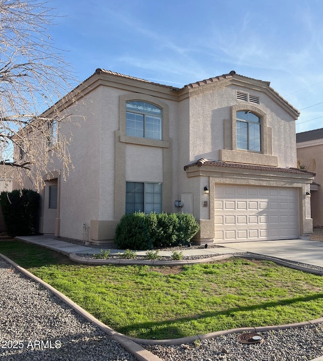 view of front of home with stucco siding, a tile roof, concrete driveway, and an attached garage