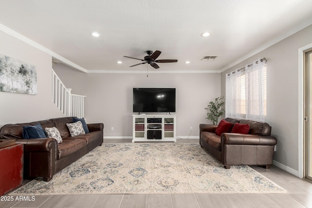 living room featuring ornamental molding, recessed lighting, visible vents, and ceiling fan