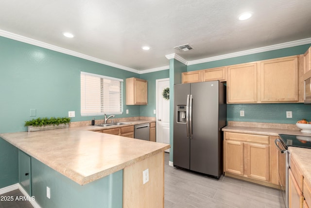 kitchen with light brown cabinetry, visible vents, and appliances with stainless steel finishes