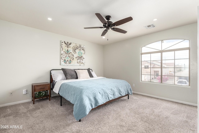 carpeted bedroom featuring recessed lighting, a ceiling fan, visible vents, and baseboards