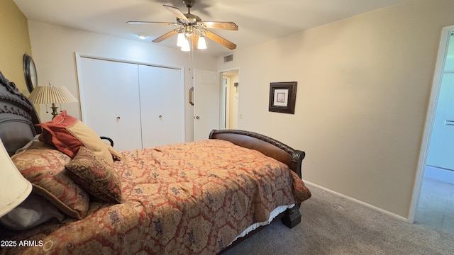 carpeted bedroom featuring a ceiling fan, visible vents, baseboards, and a closet