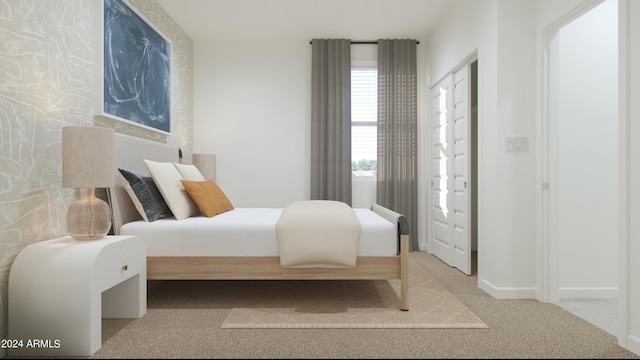 carpeted bedroom featuring baseboards