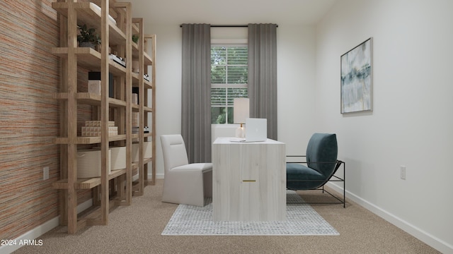 office featuring baseboards and light colored carpet