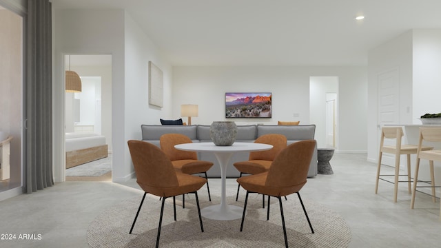 dining room with light tile patterned floors and baseboards