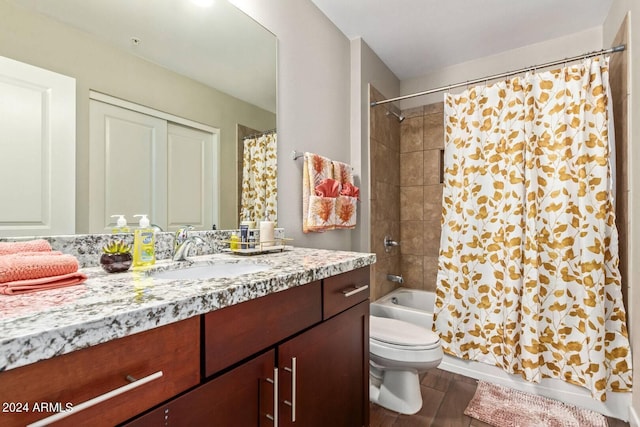 full bathroom featuring vanity, toilet, hardwood / wood-style flooring, and shower / bathtub combination with curtain